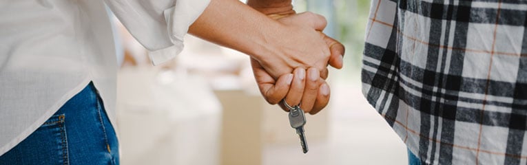 Using-an-FHA-Loan-helped-this-couple-hold-the-keys-to-their-first-home.