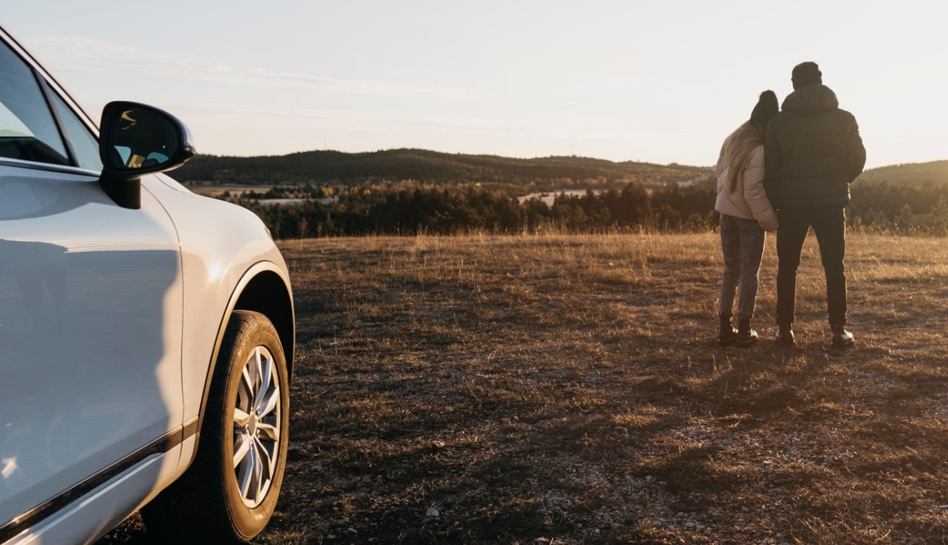 couple with a car loan from Finex Credit Union enjoying a scenic drive