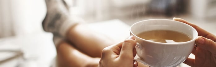 This-young-lady-is-enjoying-some-delicious-coffee-and-saving-at-the-same-time.