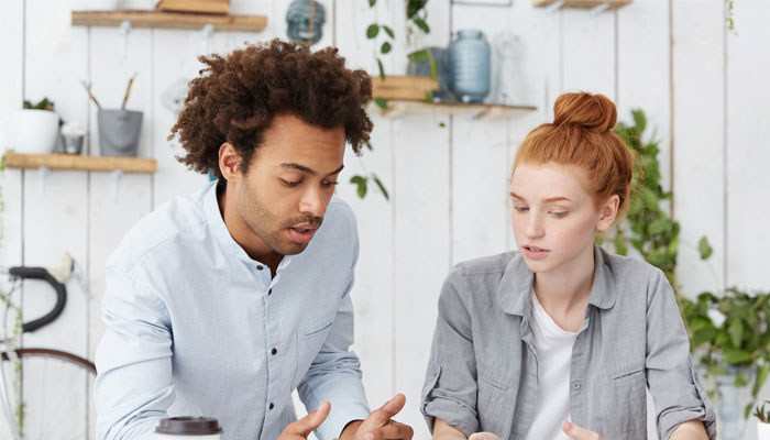 This-young-couple-is-discussing-which-second-chance-banking-option-is-the-best-for-them.