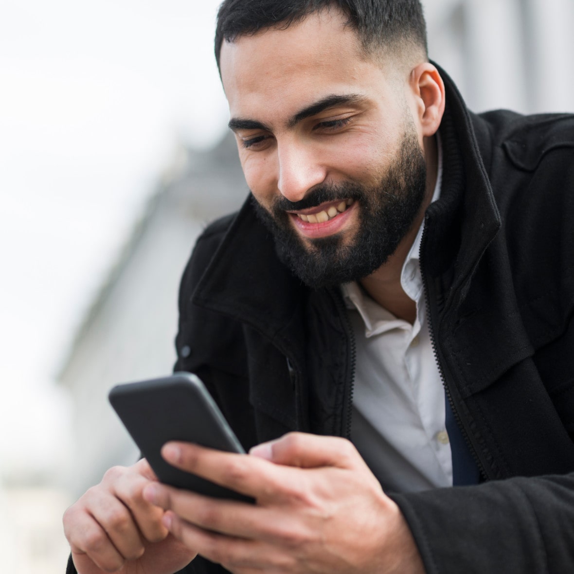 young man using the Finex Credit Union Mobile Banking App